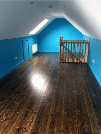 Internal House Painting in Dublin showing attic area painted blue with white ceiling by Abhaile Decorators, Ireland