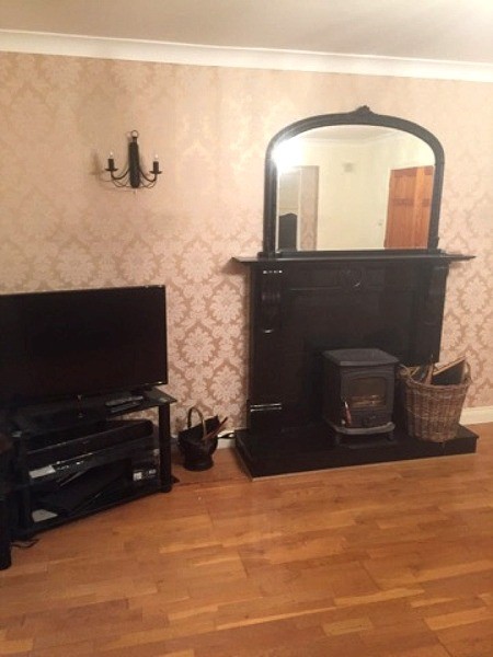 Finished wallpapering in a Dublin sitting room by Abhaile Decorators, Ireland